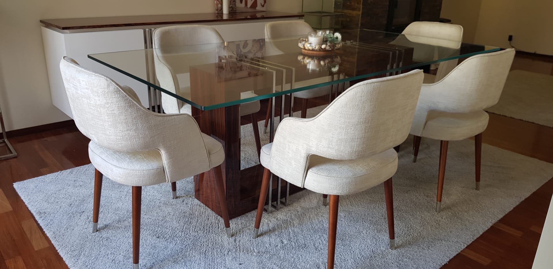 Glass table with cream chairs