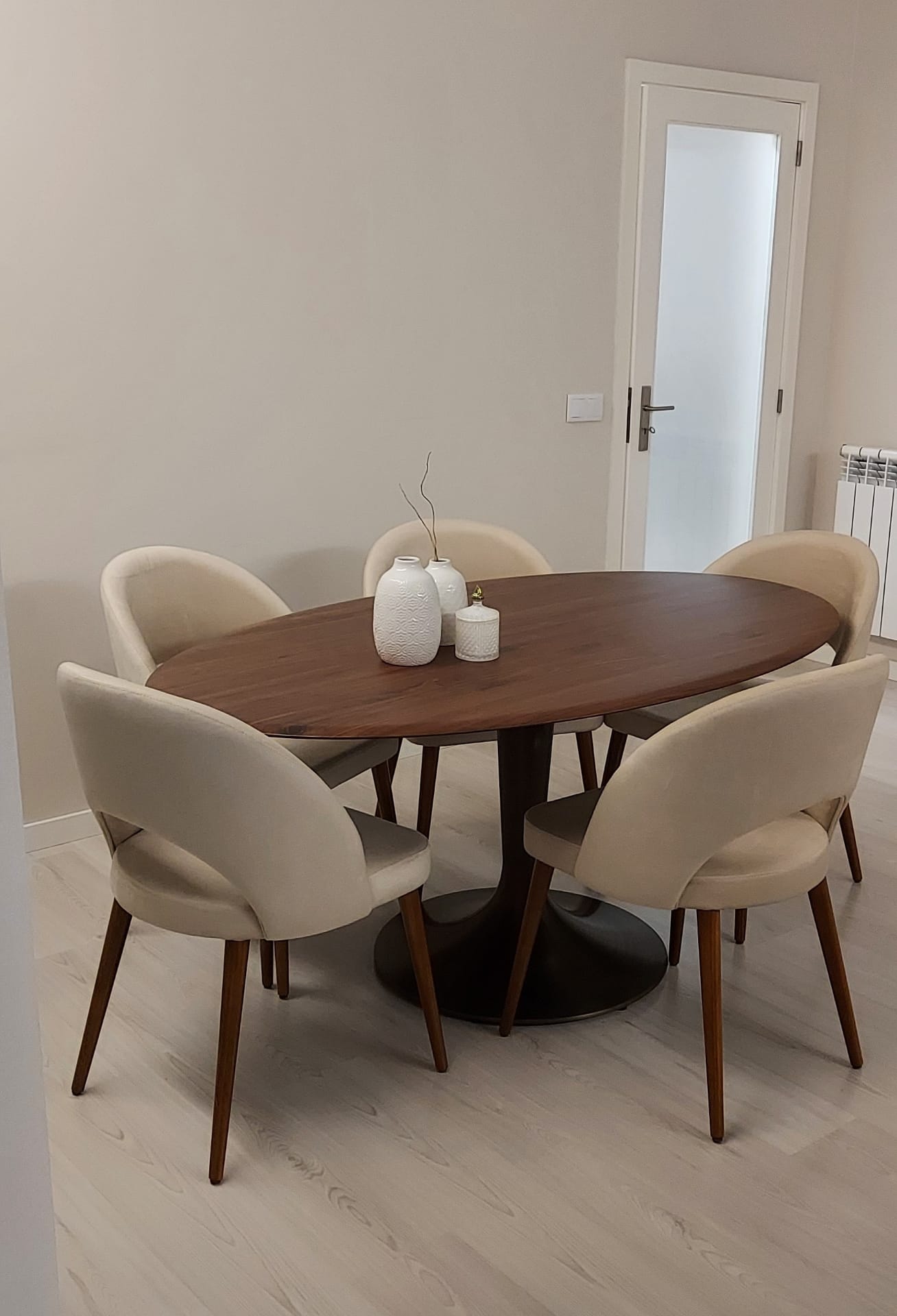 Round walnut dining table