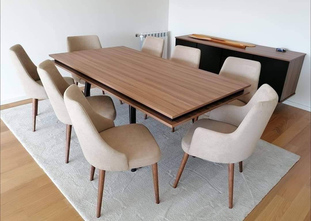 Walnut table with beige chairs